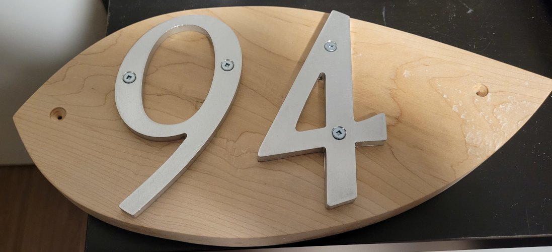 A custom leaf with meaple wood and aluminium number